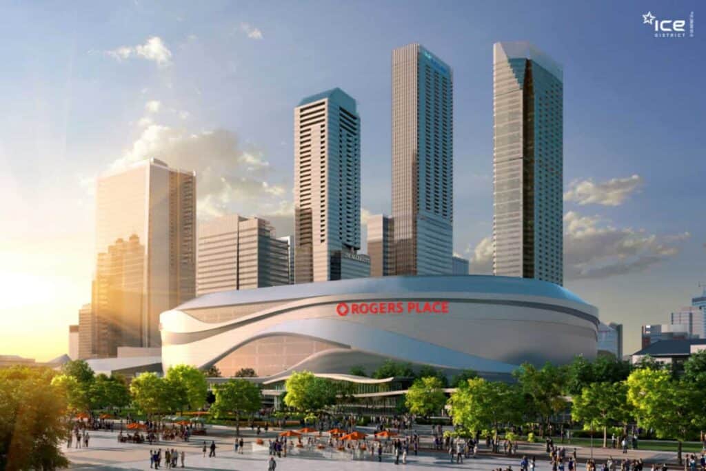 Rogers Place Edmonton arena with modern skyscrapers in the background, showcasing a vibrant cityscape and urban development.